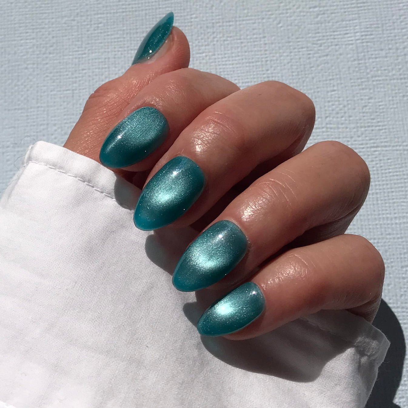 Teal Velvet Cat Eye Almond Nails for Winter Date Nights