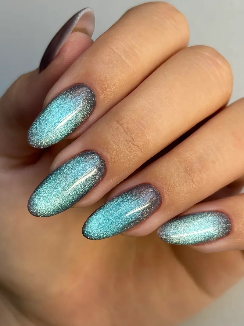 Light Aqua Teal Glitter Cat Eye Almond Nails for Winter Date Nights