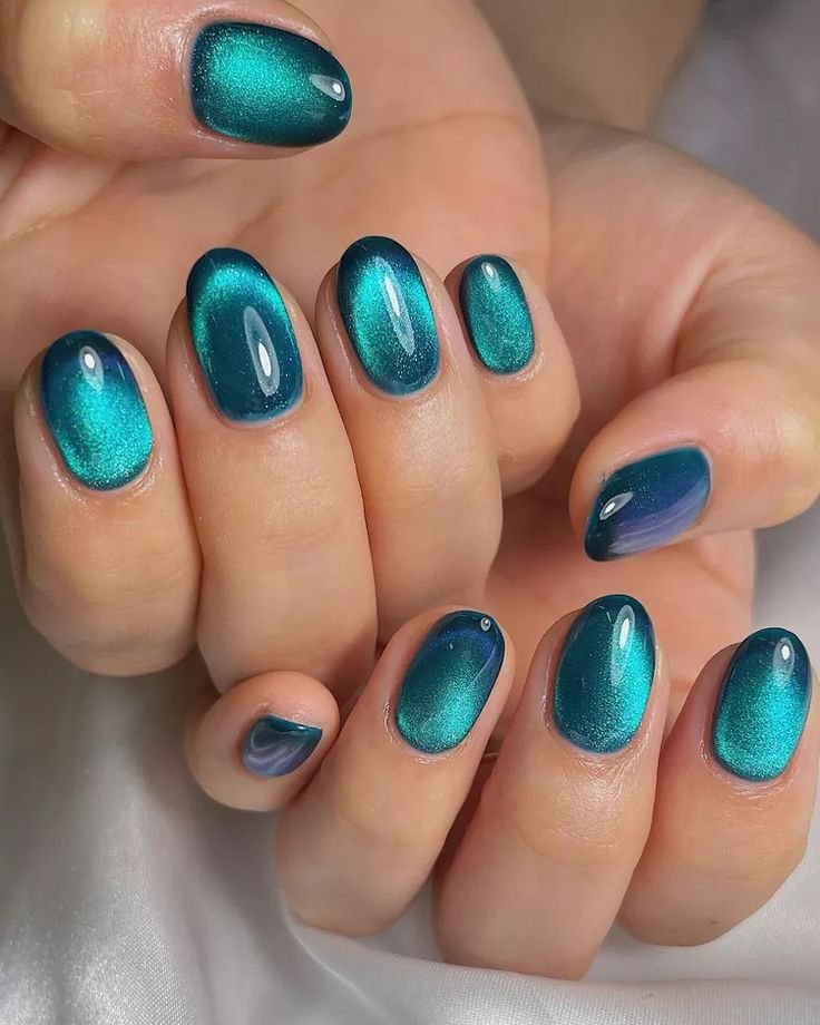Bright Teal Cat Eye Short Oval Nails for Winter Date Nights