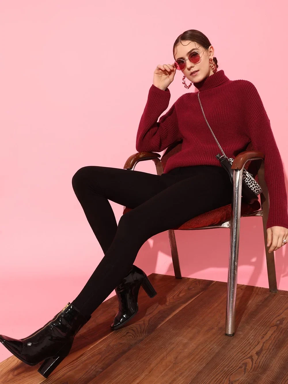 50 Thermal Layering Outfits for Cold January Days That Are Chic, Warm and Elegant 9 White Thermal Top under a Burgundy Knit Sweater with Black Leggings and Black Ankle Boots