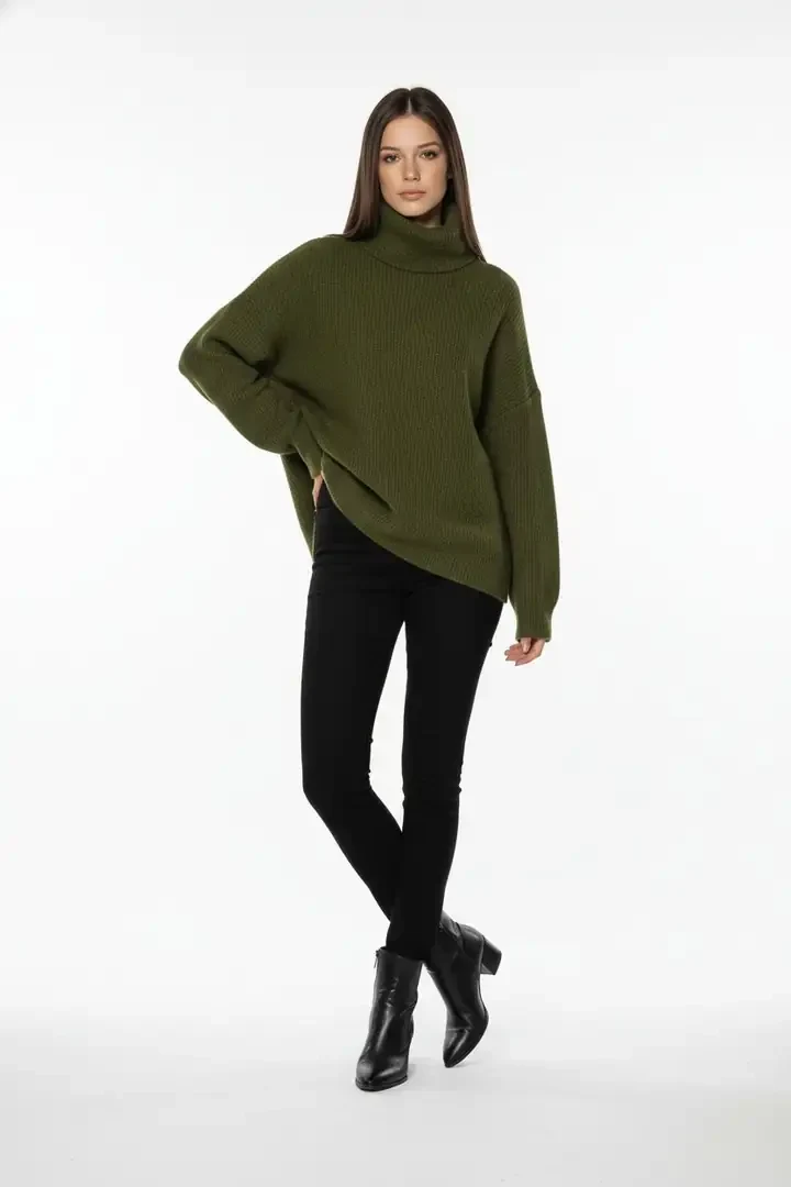 50 Thermal Layering Outfits for Cold January Days That Are Chic, Warm and Elegant 11 Black Thermal Top under a Olive Knit Sweater with Black Skinny Jeans and Black Ankle Boots