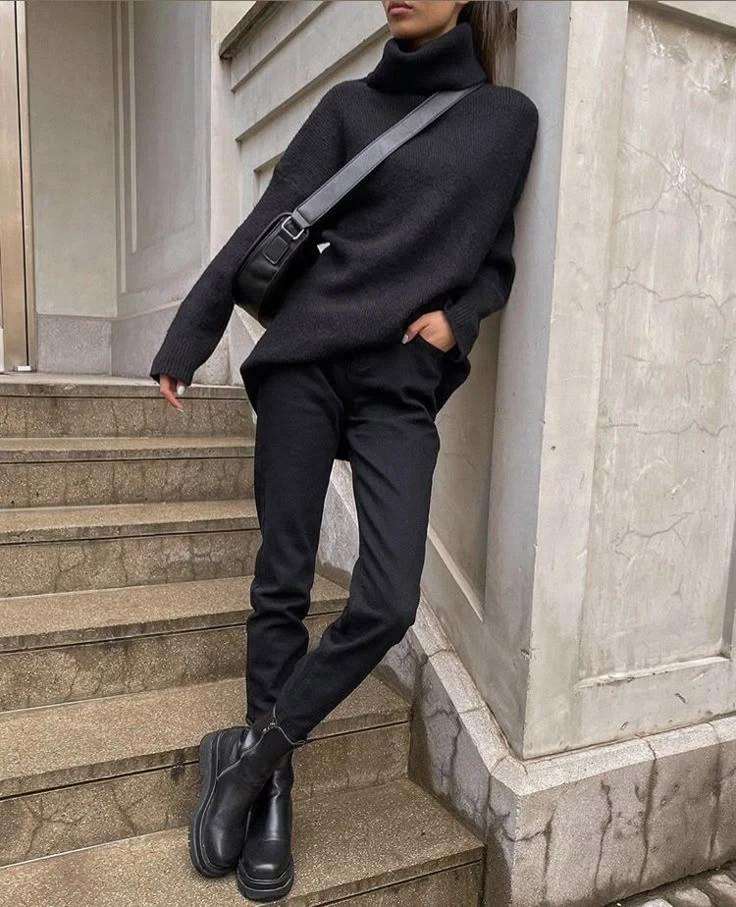 50 Thermal Layering Outfits for Cold January Days That Are Chic, Warm and Elegant 14 Burgundy Thermal Top under a Black Knit Sweater with Black Trousers and Black Ankle Boots