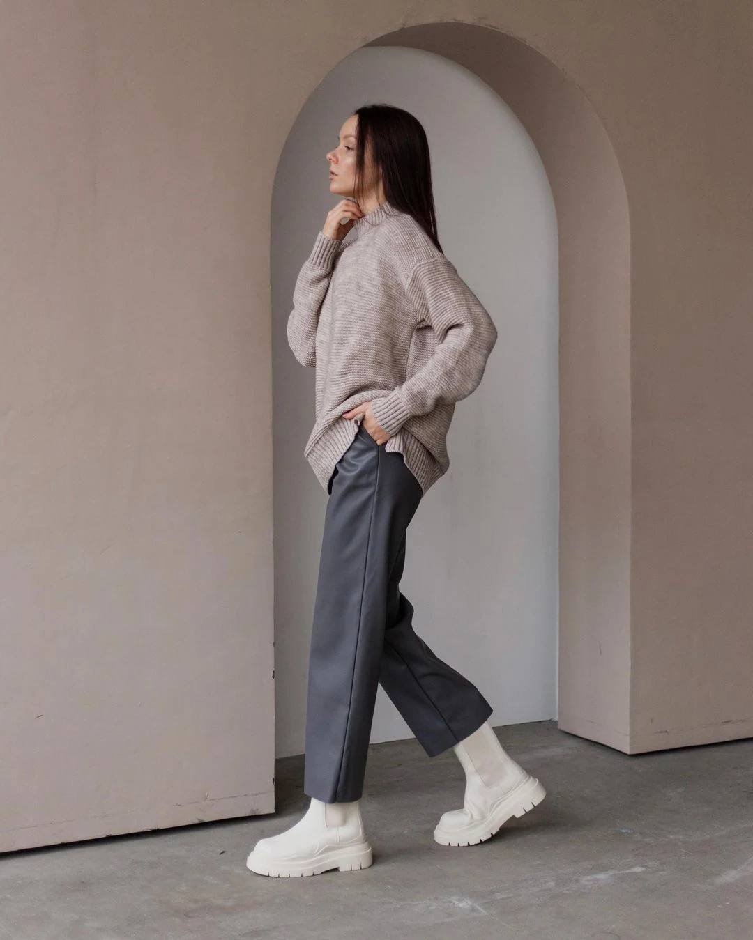 50 Thermal Layering Outfits for Cold January Days That Are Chic, Warm and Elegant 15 Grey Thermal Top under a Cream Knit Sweater with Charcoal Trousers and White Boots