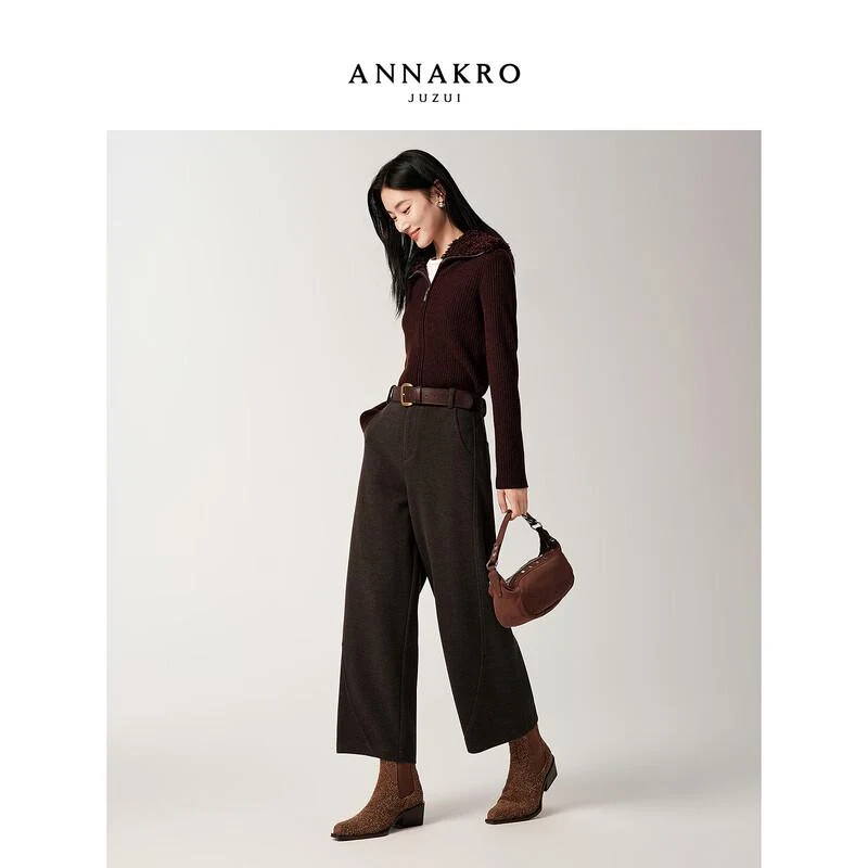 50 Thermal Layering Outfits for Cold January Days That Are Chic, Warm and Elegant 25 White Thermal Top under a Burgundy Knit Sweater with Dark Trousers and Brown Ankle Boots