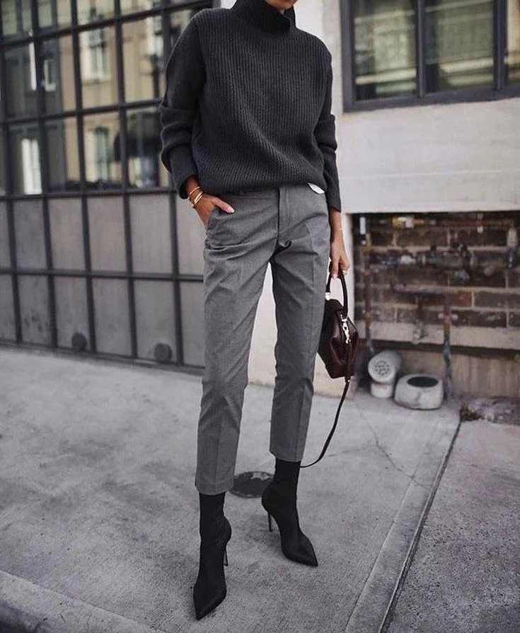 50 Thermal Layering Outfits for Cold January Days That Are Chic, Warm and Elegant 30 Burgundy Thermal Top under a Black Knit Sweater with Grey Trousers and Black Ankle Boots