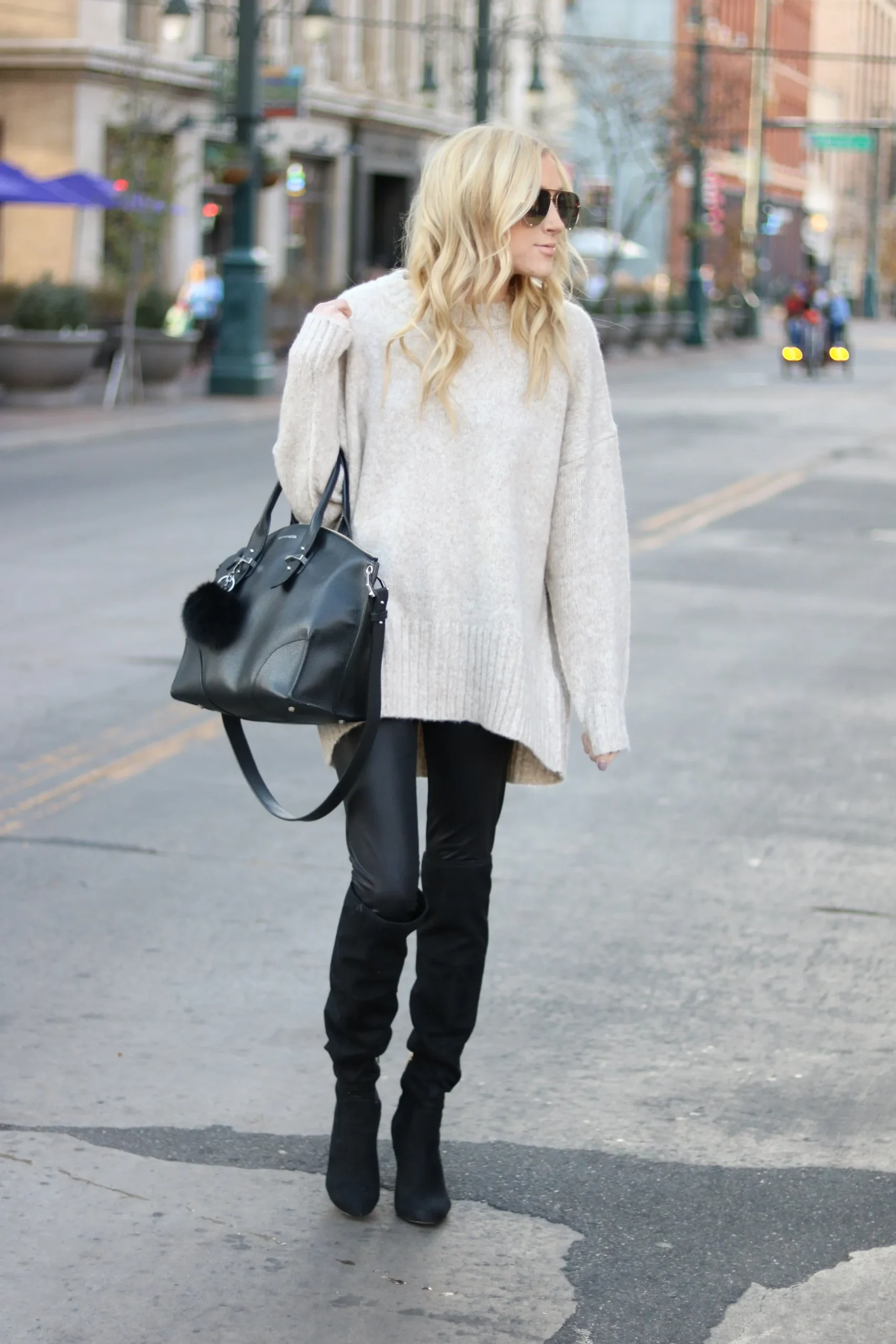 50 Thermal Layering Outfits for Cold January Days That Are Chic, Warm and Elegant 33 Black Thermal Top under a Cream Chunky Knit Sweater with Black Leggings and Black Knee-high Boots