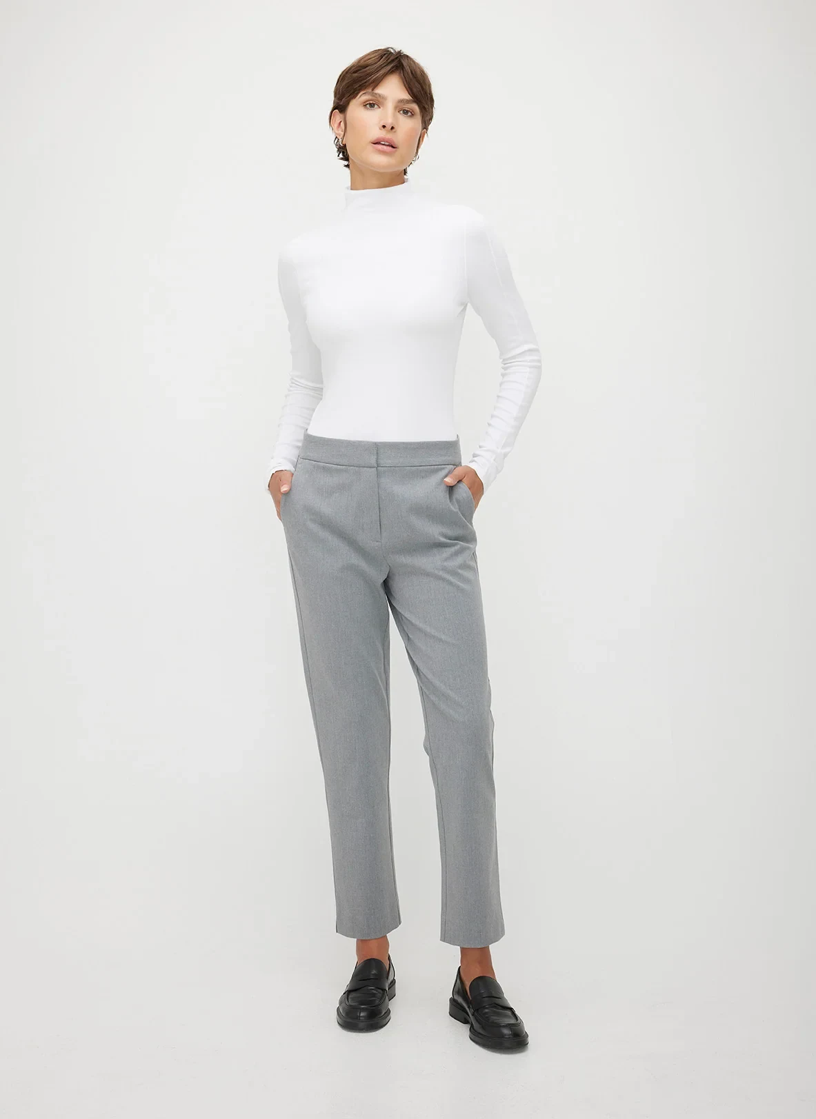 Cream Turtleneck with Grey Tailored Trousers and Black Loafers