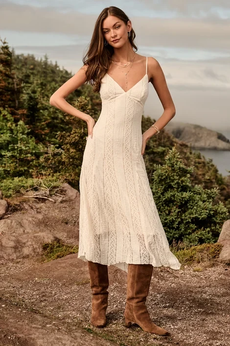 Cream lace slip dress with suede ankle boots and a delicate gold necklace