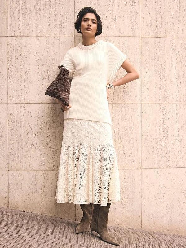 White lace scalloped dress with block-heel ankle boots and a cashmere wrap