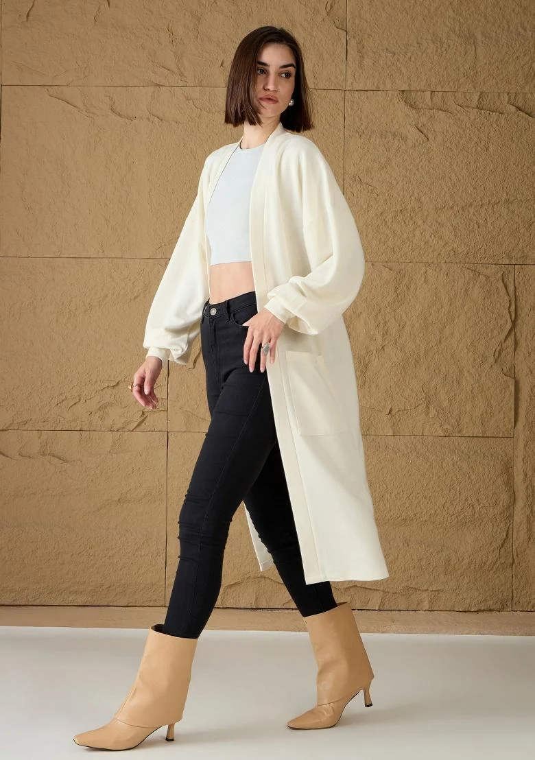 Cream Long Cardigan with Black Skinny Jeans and Tan Ankle Boots