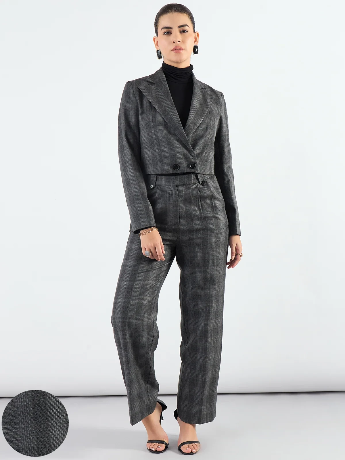 Checked peplum blazer with charcoal trousers