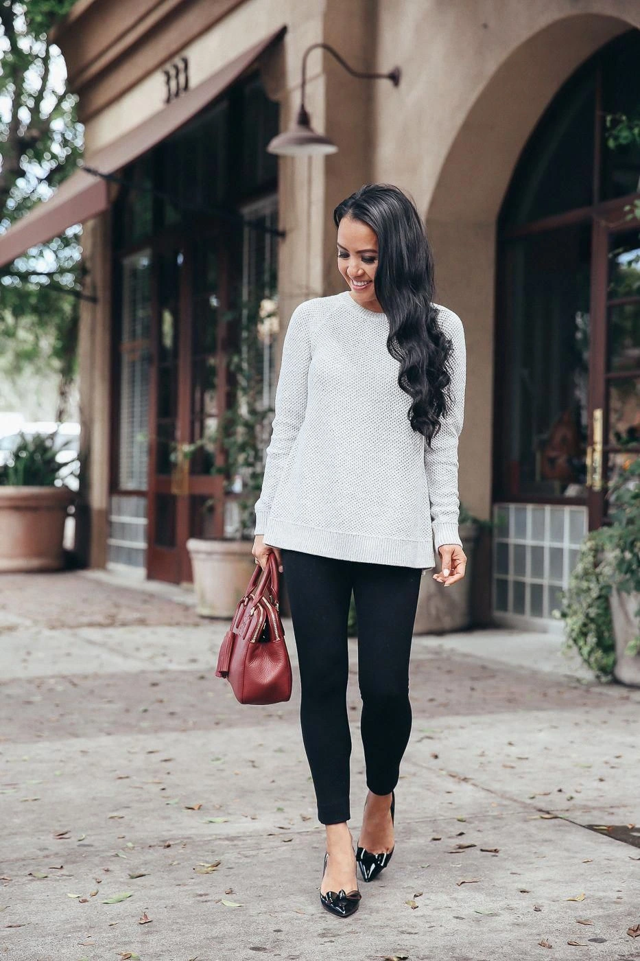 White thermal base layer, tunic sweater with leggings and elegant pointed flats