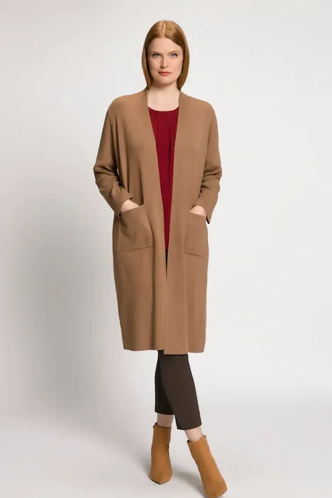 33 Women in their 30s winter layering outfits with a long cardigan and ankle boots That Are Chic, Warm and Elegant 17 Long camel cardigan, burgundy top with dark trousers and block-heel ankle boots