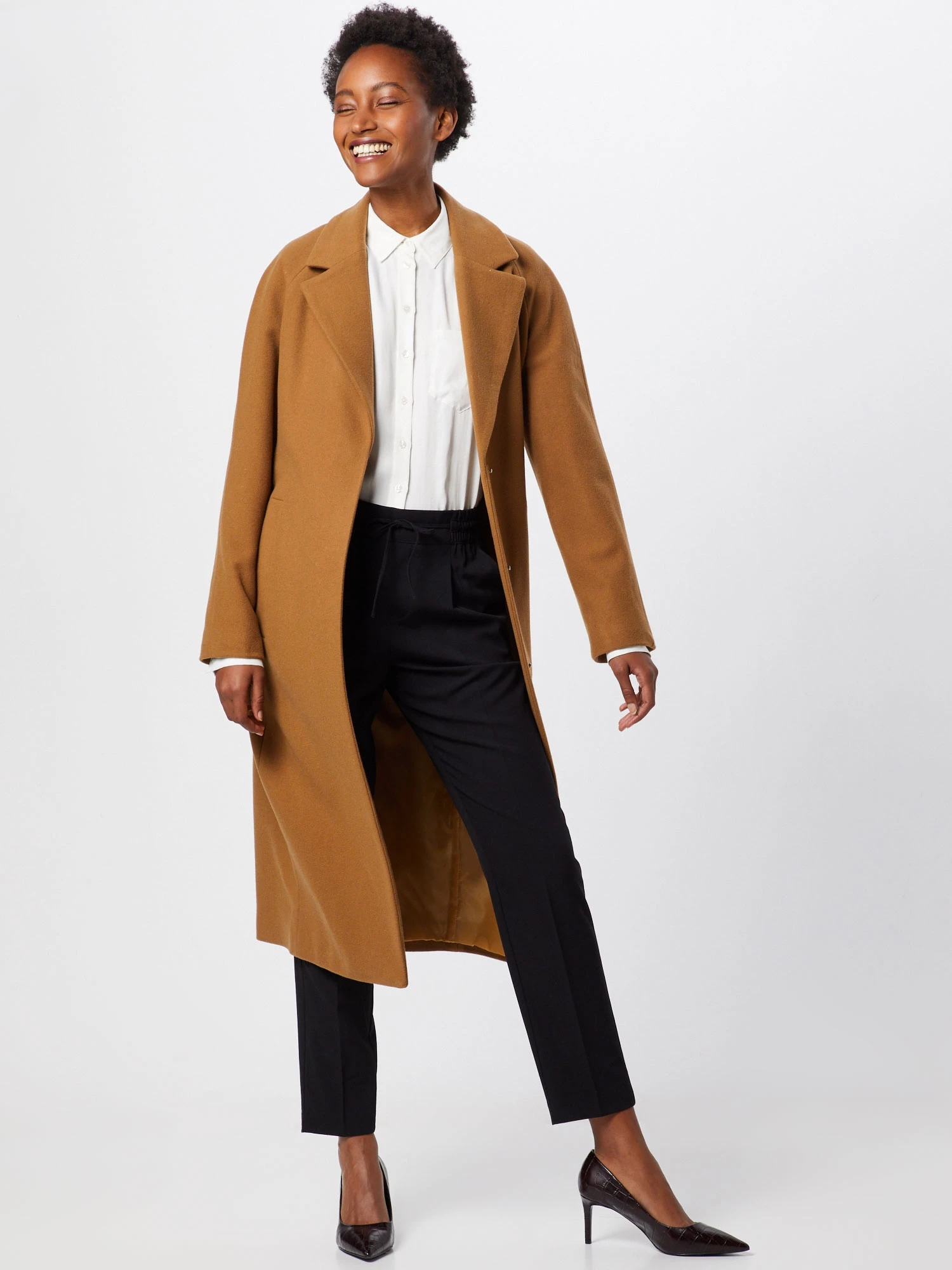 Camel Wool Coat with Black Trousers and Black Heels for a Formal Office Day