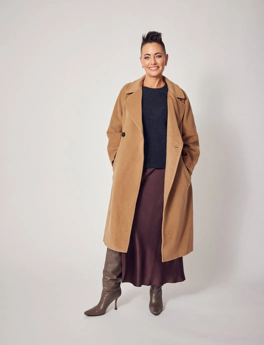 Camel Wool Coat with a Burgundy Skirt and Brown Boots for a Cold Monday