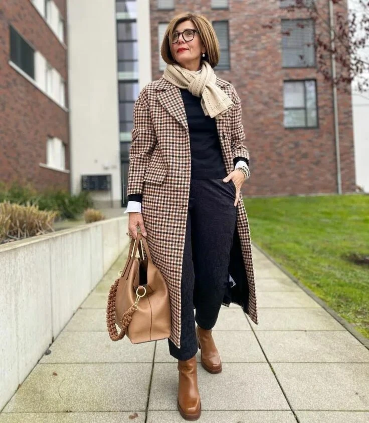 22 Checked Wool Coat Outfits for Women Over 40 for Winter Travel That Are Smart, Warm and Effortless 11 Checked Wool Coat with Navy Trousers and Brown Boots for a Family Winter Trip