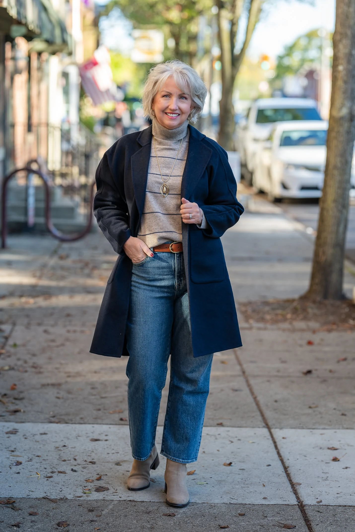 30 Long Wool Coat Outfits with Boots for Women Over 40 for Cold Walks That Are Warm, Smart and Effortless 29 Long Navy Wool Coat with Blue Jeans and Beige Boots for a Weekend Cold Walk