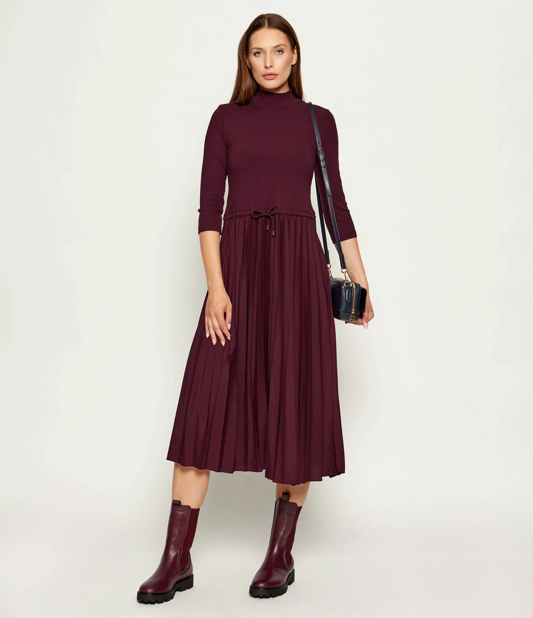 Wine pleated midi dress with block-heel ankle boots and a chic crossbody bag
