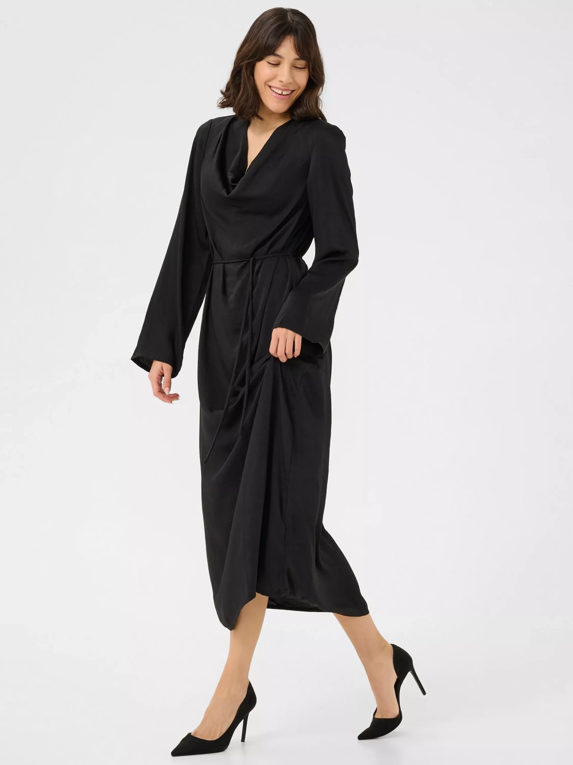 Black satin midi dress with black pointed heels and a cashmere wrap