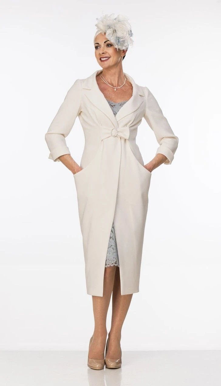 25 Wool Wrap Coat Outfits for Women Over 40 for Winter Weddings That Are Warm, Elegant and Effortlessly Chic 9 Cream Wool Wrap Coat with a Pale Dress and Nude Heels for a Winter Wedding
