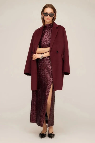 25 Wool Wrap Coat Outfits for Women Over 40 for Winter Weddings That Are Warm, Elegant and Effortlessly Chic 16 Burgundy Wool Coat with a Burgundy Sequin Dress and Black Heels for a New Year Wedding