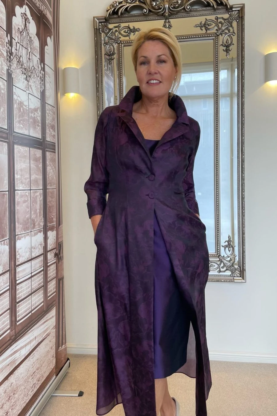 25 Wool Wrap Coat Outfits for Women Over 40 for Winter Weddings That Are Warm, Elegant and Effortlessly Chic 21 Purple Wool Coat with a Purple Dress and Nude Heels for a Winter Wedding