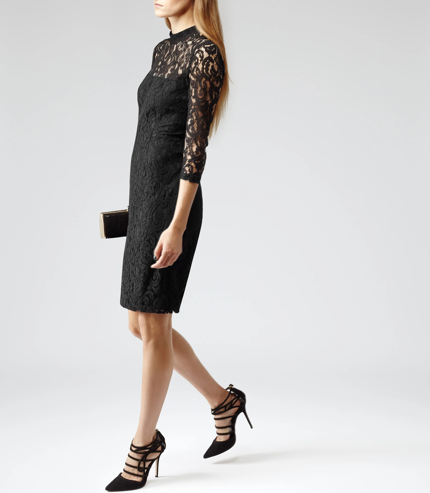 50 Women Over 50 Black Lace Outfits for Valentine Nights That Are Chic, Romantic and Easy to Wear 39 Black lace sheath dress with black pointed heels and a beaded clutch