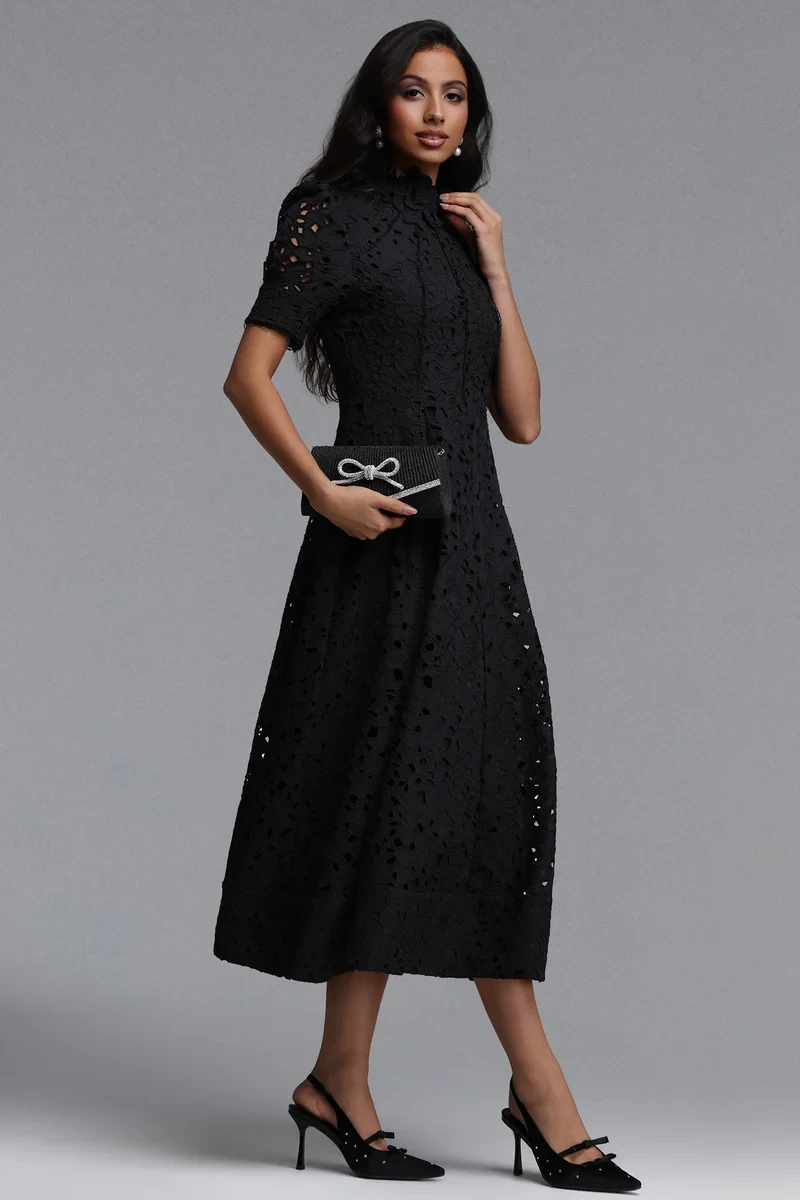 50 Women Over 50 Black Lace Outfits for Valentine Nights That Are Chic, Romantic and Easy to Wear 46 Jet black lace dress with black pointed heels and a chic crossbody bag