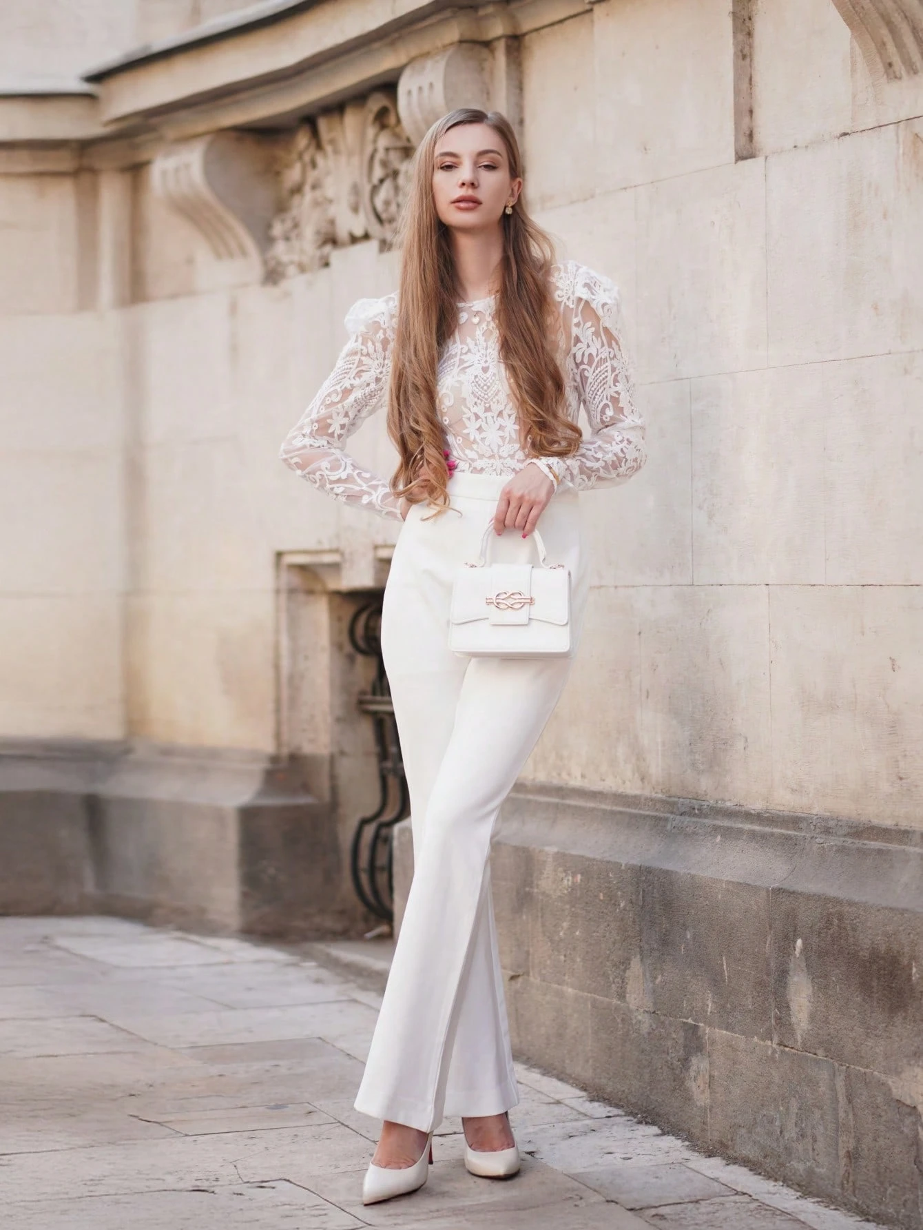 40 Women Over 50 Lace Blouse Outfits for Romantic Dinners That Are Chic, Romantic and Easy to Wear 35 Ivory lace blouse and evening trouser outfit with low-heeled pumps and a chic crossbody bag