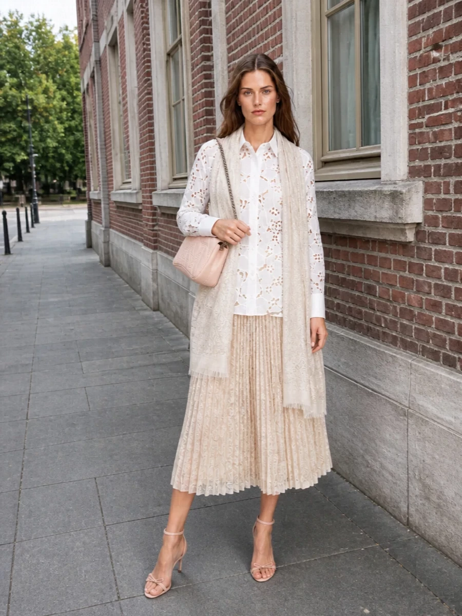 40 Women Over 50 Lace Blouse Outfits for Romantic Dinners That Are Chic, Romantic and Easy to Wear 39 Ivory lace blouse and pleated skirt outfit with leather ankle boots and a silk scarf