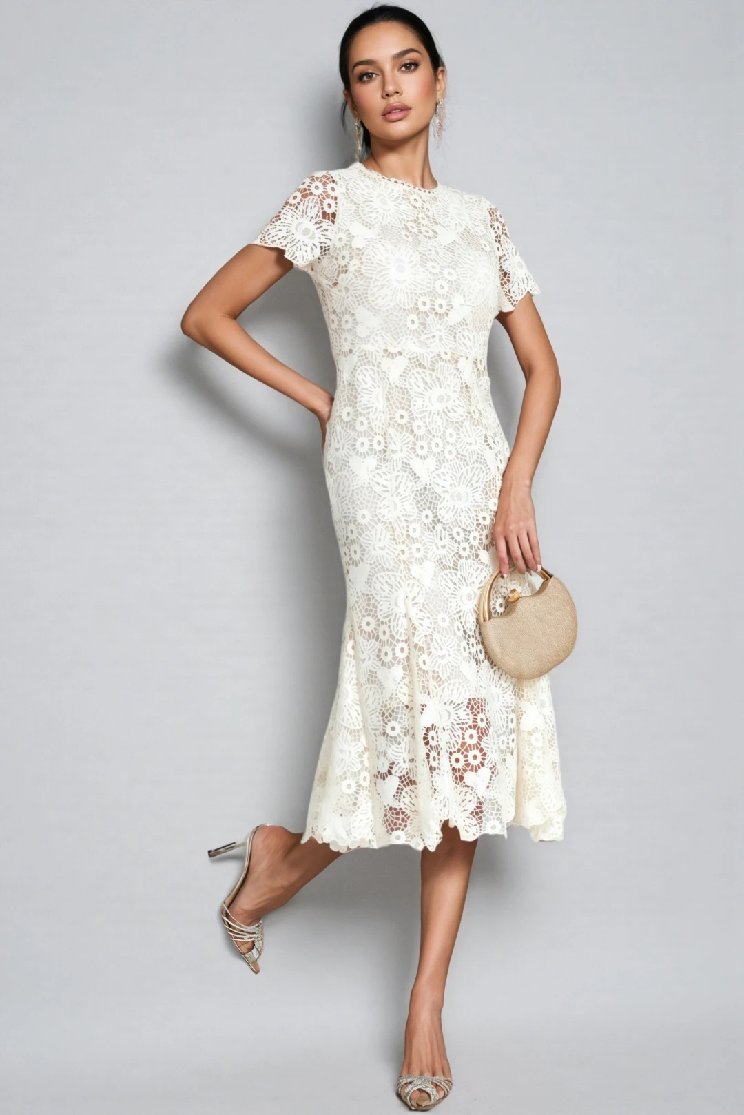 Soft white lace A-line dress with elegant pointed flats and a small structured clutch