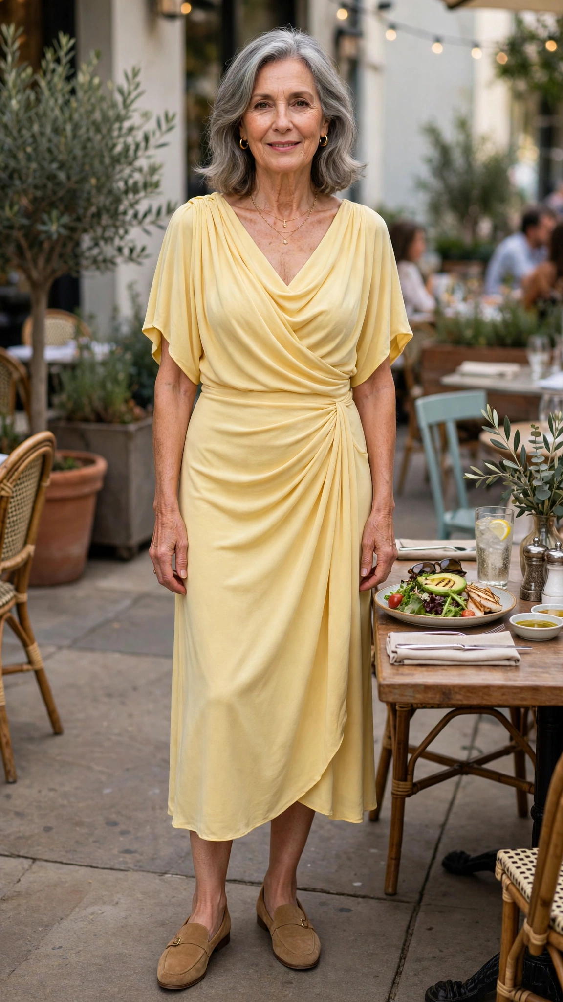 Butter yellow draped midi dress with tan loafers