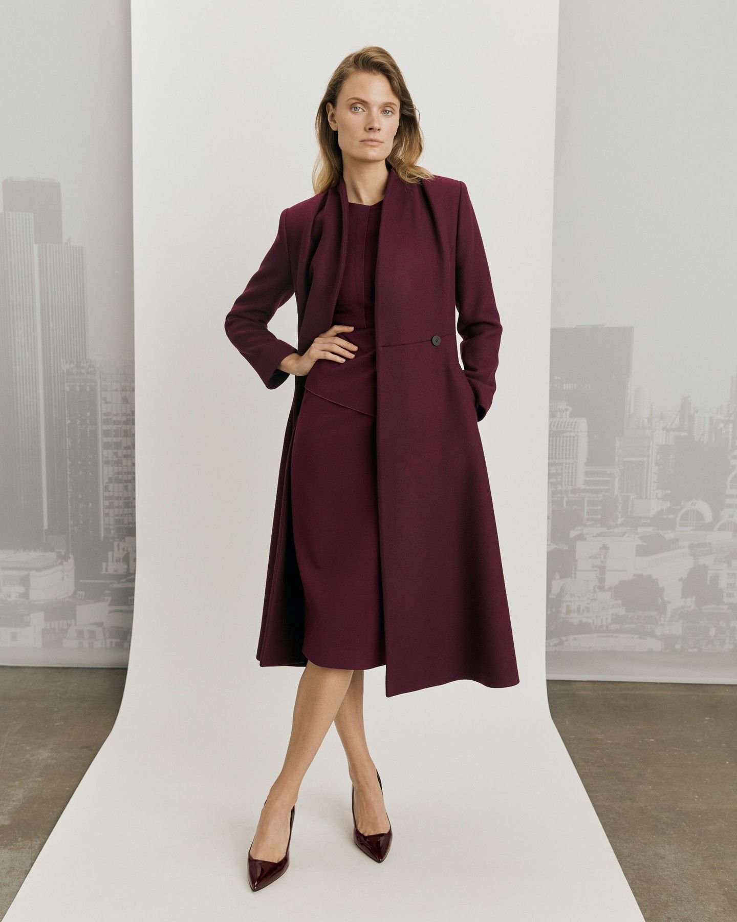 Aubergine Wool Wrap Coat Over a Velvet Midi Dress